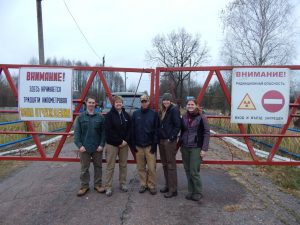 Courtesy Jim Beasley The research team pauses for a photo at the entrance of the Chernobyl Exclusion Zone in Belarus. (Left to right) Dr. Jim Beasley, Dr. Stacey Lance, Dr. Mike Byrne, Cara Love and Sarah Webster.